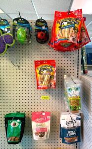 DESCRIPTION: ASSORTED DOG TREATS AS SHOWN INFORMATION: SEE PHOTOS FOR MORE DETAIL, TOYS NOT INLCUDED LOCATION: RETAIL SHOP QTY: 1