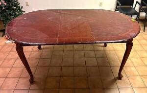 DESCRIPTION: WOODEN DINING TABLE INFORMATION: TOP HAS SOME SCRATCHES - SEE PHOTOS SIZE: 72"X42" LOCATION: BREAK ROOM QTY: 1