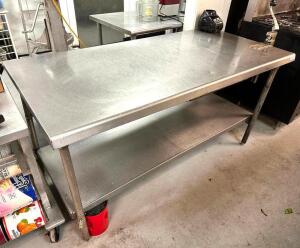 69" X 33" STAINLESS TABLE W/ MOUNTED CAN OPENER.