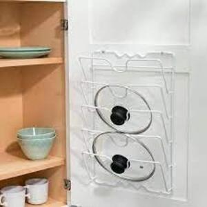 DESCRIPTION: (1) WALL MOUNT LID ORGANIZER BRAND/MODEL: HOME BASICS RETAIL$: $20.29 EA QTY: 1