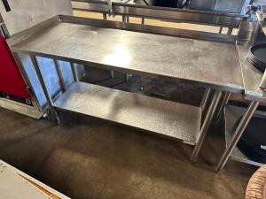 DESCRIPTION: 60" X 24" ALL STAINLESS TABLE 2/ 2" SURROUND SPLASH SIZE 60" X 24" LOCATION: BAY 7 QTY: 1