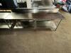 DESCRIPTION: 8' X 24" ALL STAINLESS TABLE W/ 4" BACK SPLASH ADDITIONAL INFORMATION W/ UNDER SHELF. SIZE 8' X 24" LOCATION: BAY 7 QTY: 1 - 4