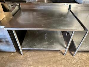 DESCRIPTION: 48" X 30" STAINLESS TABLE W/ 4" BACK SPLASH ADDITIONAL INFORMATION W/ UNDER SHELF. LOCATION: BAY 7 QTY: 1