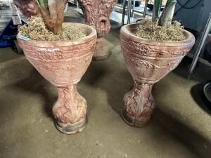 DESCRIPTION: (2) 18" STONE PLANTERS ADDITIONAL INFORMATION ONE HAS CRACKED BASE LOCATION: BAY 7 THIS LOT IS: SOLD BY THE PIECE QTY: 2