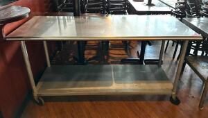 DESCRIPTION: 72" X 30" STAINLESS PREP TABLE W/ LOWER STORAGE SHELF ON CASTERS SIZE: 72" X 30"