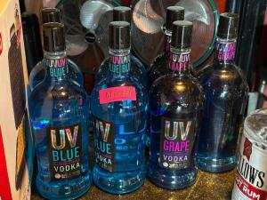 (7) - BOTTLES OF ASSORTED UV VODKA
