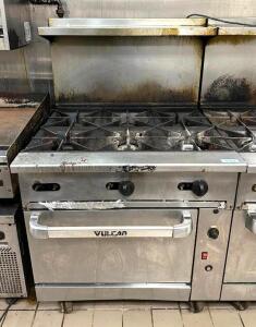 DESCRIPTION: 6-BURNER NATURAL GAS RANGE WITH OVEN AND BACKSPLASH ON CASTERS BRAND/MODEL: VULCAN LOCATION: KITCHEN QTY: 1