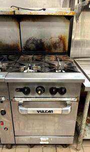 DESCRIPTION: 4-BURNER NATURAL GAS RANGE WITH OVEN ON CASTERS BRAND/MODEL: VULCAN LOCATION: KITCHEN QTY: 1