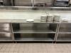 DESCRIPTION: 5' STAINLESS STEEL WORK TABLE WITH STAINLESS SHELVING STORAGE SIZE: 60"X15"X35" LOCATION: KITCHEN QTY: 1 - 2