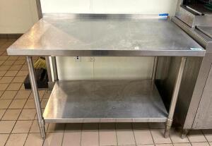 DESCRIPTION: 48" STAINLESS STEEL TABLE WITH STAINLESS UNDERSHELF SIZE: 48"X30"X35" LOCATION: KITCHEN QTY: 1