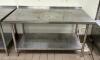 DESCRIPTION: 50" STAINLESS STEEL TABLE WITH STAINLESS UNDERSHELF SIZE: 60"X30"X34.5" LOCATION: KITCHEN QTY: 1