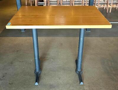 DESCRIPTION: 4' WOODEN PUB TABLE WITH DOUBLE BASE SIZE: 48"X30"X42.5" LOCATION: MAIN BAR QTY: 1