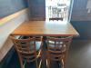 DESCRIPTION: 4' WOODEN PUB TABLE WITH DOUBLE BASE SIZE: 48"X30"X42.5" LOCATION: MAIN BAR QTY: 1 - 2