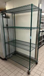 DESCRIPTION: 4-TIER WIRE SHELVING UNIT ON CASTERS SIZE: 48"X24"X79" LOCATION: KITCHEN QTY: 1