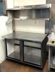 STAINLESS WORK TABLE WITH DOUBLE RISER SHELF AND STORAGE