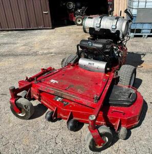 DESCRIPTION: EXMARK 60" TURF TRACER X-SERIES WALK BEHIND MOWER BRAND / MODEL: TTX680PKC60400 ADDITIONAL INFORMATION SN# 316630086, 1228.1 HOURS. COMES