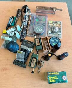 DESCRIPTION: (1) LOT OF ASSORTED HUNTING SUPPLIES, GAME CALLS, AND SCENTS. LOCATION: BUILDING 4 THIS LOT IS: ONE MONEY QTY: 1