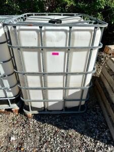 DESCRIPTION: 275 GALLON LIQUID SHIPPING TOTE W/ CAGE. - EMPTY LOCATION: BUILDING 2 / OUTSIDE QTY: 1