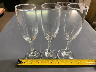 DESCRIPTION (13) CHAMPAGNE GLASSES THIS LOT IS SOLD BY THE PIECE. LOCATION BAY 7 QUANTITY 13