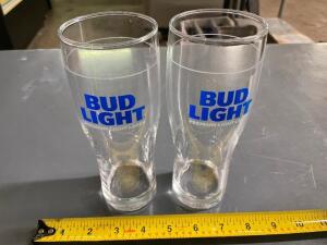 DESCRIPTION (36) BUD LIGHT PILSNER GLASSES - SOLD WITH RACK THIS LOT IS SOLD BY THE PIECE. LOCATION BAY 7 QUANTITY 36