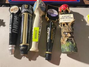 DESCRIPTION (5) ASSORTED TAP HANDLES. THIS LOT IS ONE MONEY LOCATION BAY 7 QUANTITY 1