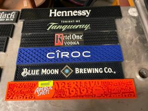 DESCRIPTION (1) LOT OF ASSORTED BAR MATS. LOCATION BAY 6 QUANTITY 1