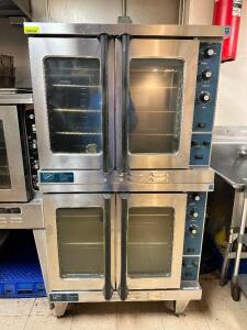 DESCRIPTION: DUKE DOUBLE STACK ELECTRIC CONVECTION OVEN. BRAND / MODEL: DUKE E101-E ADDITIONAL INFORMATION 208 VOLT, 3 PHASE. SN# 20-JHJB-0029 LOCATIO