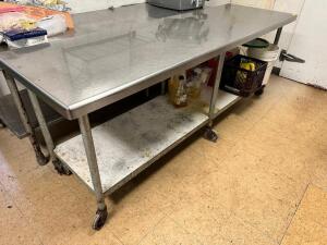 DESCRIPTION: 96" X 30" STAINLESS TABLE - ON CASTERS SIZE 96" X 30'" LOCATION: KITCHEN QTY: 1