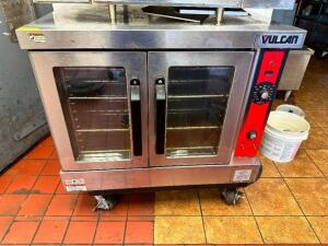 DESCRIPTION: VULCAN SINGLE DECK ELECTRIC CONVECTION OVEN. ( ON CASTERS ) BRAND / MODEL: VULCAN ADDITIONAL INFORMATION VERY CLEAN LOCATION: RESTAURANT