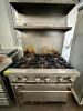 DESCRIPTION: JADE RANGE SIX BURNER RANGE W/ LOWER OVEN BRAND / MODEL: JADE RANGE ADDITIONAL INFORMATION NATURAL GAS. W/ TWO TIER STAINLESS OVER SHELF