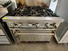 DESCRIPTION: JADE RANGE SIX BURNER RANGE W/ LOWER OVEN BRAND / MODEL: JADE RANGE ADDITIONAL INFORMATION NATURAL GAS. W/ TWO TIER STAINLESS OVER SHELF - 2