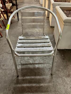 DESCRIPTION: (6) METAL PATIO STACK CHAIRS W/ CHROME FINISH LOCATION: BAY 6 THIS LOT IS: SOLD BY THE PIECE QTY: 6