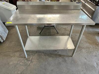 DESCRIPTION: 48" X 24" STAINLESS TABLE W/ 4" BACK SPLASH SIZE 48" X 24" X 72" LOCATION: BAY 6 QTY: 1