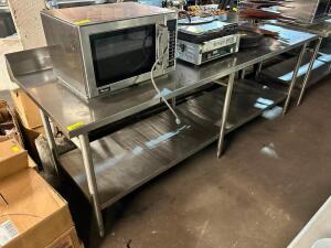 DESCRIPTION: 8' X 30" ALL STAINLESS TABLE W/ 4" BACK SPLASH ADDITIONAL INFORMATION CONTENTS ARE NOT INCLUDED SIZE 8' X 30" LOCATION: BAY 7 QTY: 1