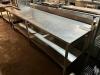 DESCRIPTION: 10' X 30" ALL STAINLESS TABLE W/ MOUNTED CAN OPENER. ADDITIONAL INFORMATION W/ 4" BACK SPLASH SIZE 10' X 30" LOCATION: BAY 7 QTY: 1