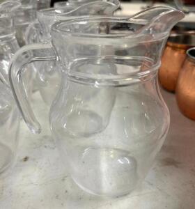 DESCRIPTION: (9) SMALL GLASS PITCHERS LOCATION: BAY 6 THIS LOT IS: SOLD BY THE PIECE QTY: 9