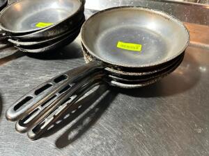 DESCRIPTION: (4) 10" SKILLETS LOCATION: BAY 6 THIS LOT IS: SOLD BY THE PIECE QTY: 4