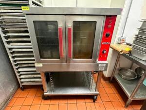 DESCRIPTION: VULCAN SINGLE DECK ELECTRIC CONVECTION OVEN. BRAND / MODEL: VC4ED ADDITIONAL INFORMATION SN# 54-1012136, 208 VOLT, 3 / 1 PHASE. ON CASTER
