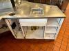 DESCRIPTION: 100' X 50" SEMI CIRCLE STAINLESS COUNTER W/ PARTITION AND SNEEZE GUARD FRONT. ADDITIONAL INFORMATION W/ RIGHT SIDE STAINLESS COUNTER EXTE - 12