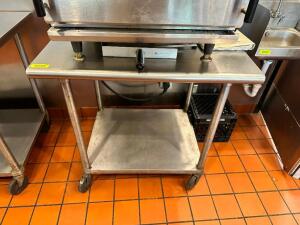 DESCRIPTION: 36" X 30" ALL STAINLESS TABLE. ADDITIONAL INFORMATION CONTENTS NOT INCLUDED. SIZE 36" X 30" LOCATION: KITCHEN QTY: 1