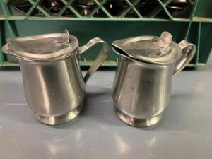 MILK CRATE AND CONTENTS - APPROX. 30 STAINLESS CREAMER DECANTERS