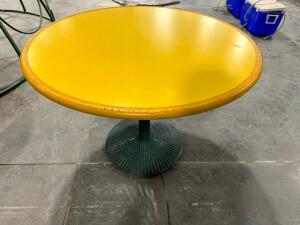 (4) ASSORTED 42" ROUND COMPOSITE TABLES W/ HEAVY DUTY METAL BASES.
