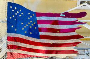 DESCRIPTION: TATTERED METAL FLAG SIGN SIZE: 47"X29" QTY: 1