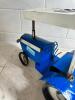 DESCRIPTION: HAND CRAFTED METAL NEW HOLAND TRACTOR TOY SIZE: 16"X10"X13" QTY: 1 - 4