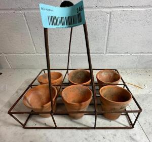 DESCRIPTION: METAL BASKET WITH (6) CLAY GARDEN POTS SIZE: 13"X9-1/2" QTY: 1