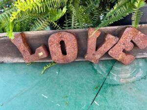 DESCRIPTION: RUSTY LOVE SIGN ON BARNWOOD SIZE: 38"X7"X1" QTY: 1