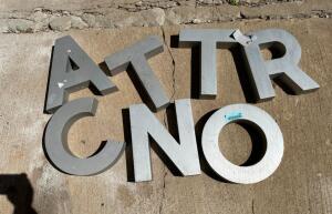 DESCRIPTION: (7) ALUMINUM LETTERS SIZE: 12"X10" QTY: 1