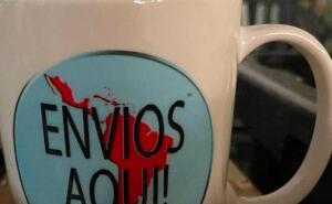 (1) CASE OF "ENVOIS AQUI" LOGO'ED COFFEE MUGS