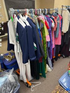 (3) - ROLLING CLOTHING RACKS WITH ASSORTED COSTUMES