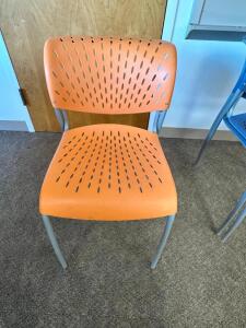 (2) ORANGE PLASTIC STACKING CHAIRS